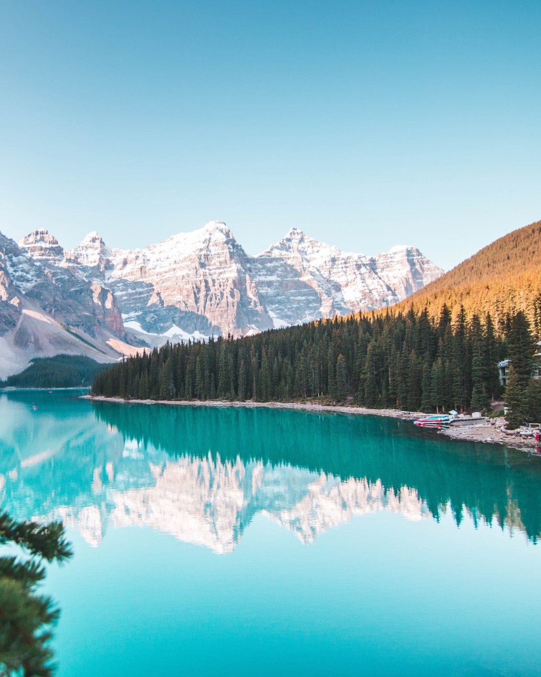 Turquoise mountain lake with snow-capped peaks